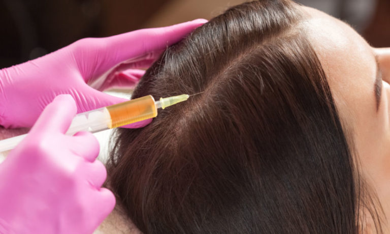 Home 3 Cosmetologist does prp therapy against hair loss of a beautiful woman in a beauty salon. Cosmetology concept.